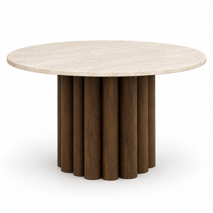 Nolo round dining table with a travertine top on an espresso oak fluted-stave base, three-quarter view
