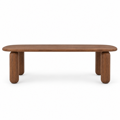 Ruvo dining table long-side view showing the curved oval top and four pillar legs in chestnut
