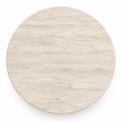 Vello dining table top showing the clean round travertine surface