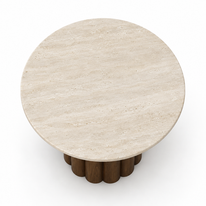Nolo dining table top showing the clean round travertine surface
