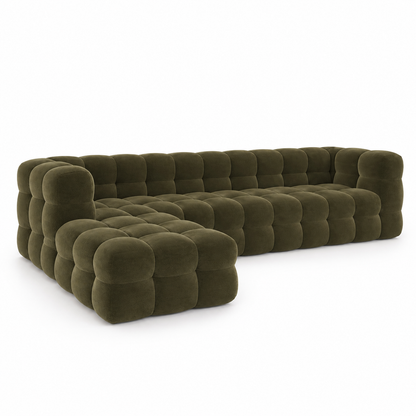 Bea modular sofa in olive velvet with bubble-tufted cushions, two rounded arms and a chaise return, three-quarter view