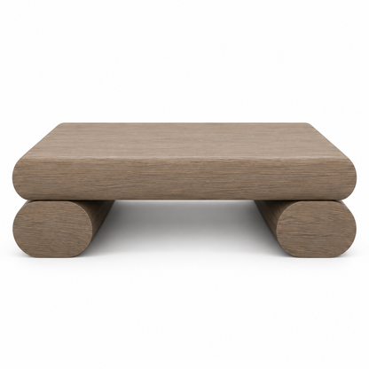Rulo coffee table front view showing the rounded slab stacked above the cylindrical bar in taupe-greige
