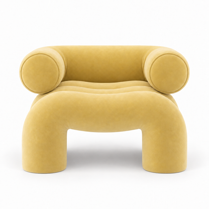 Cira armchair front view showing round bolster arms and arched leg gap in butter yellow velvet