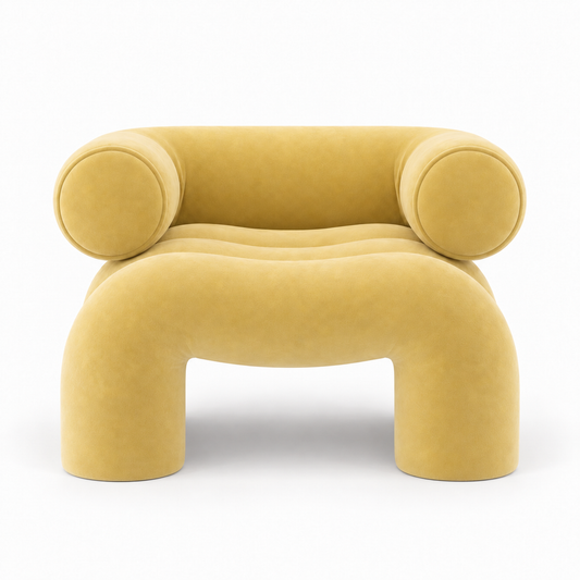 Cira armchair front view showing round bolster arms and arched leg gap in butter yellow velvet