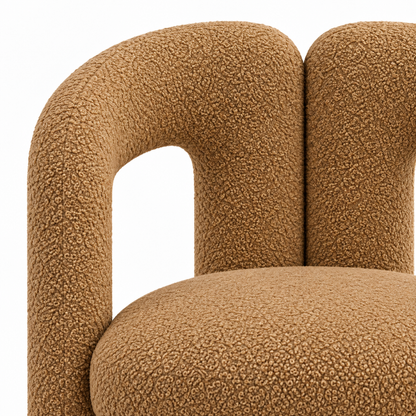 Close-up of camel boucle texture where the two arches meet at the top of the Dovo dining chair