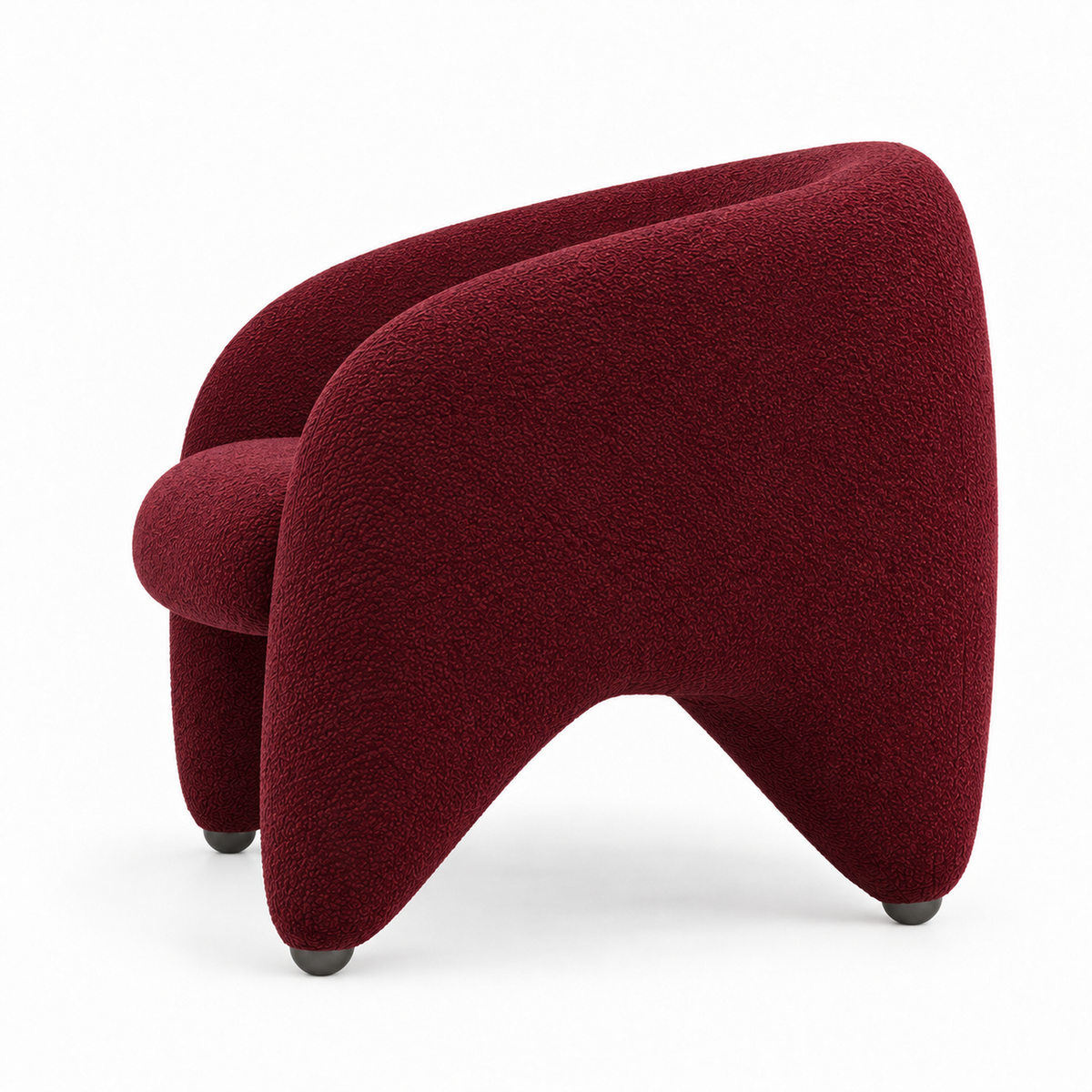 Faye armchair side profile showing the shell curve and tapered leg
