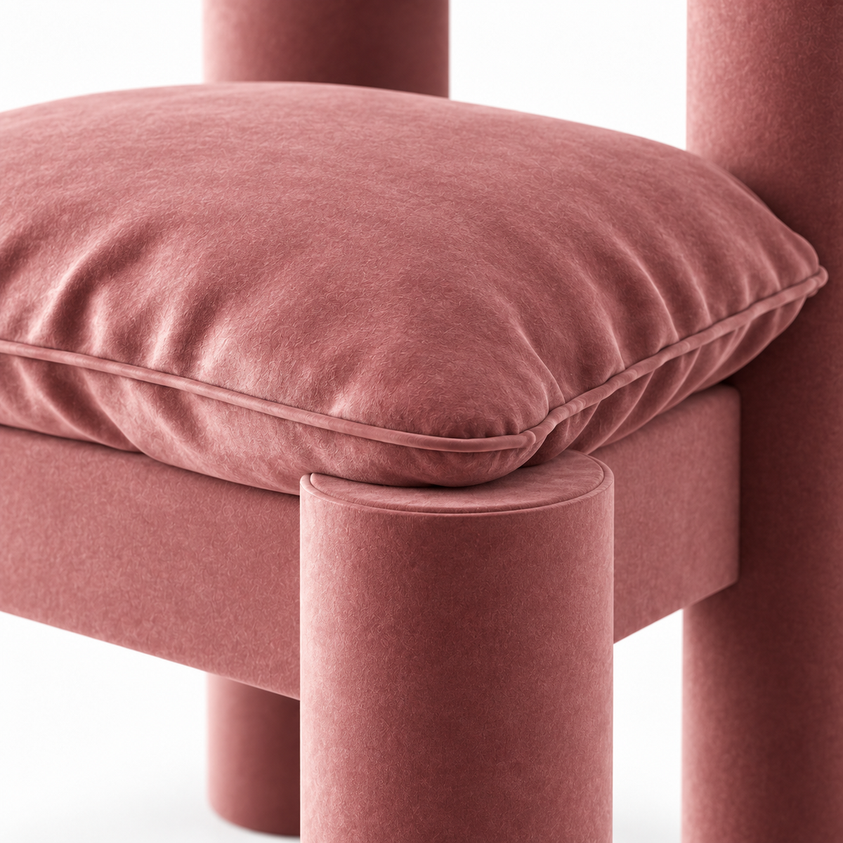 Close-up of Milo accent chair blush velvet cushion showing soft sheen and folds

