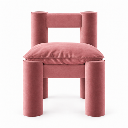 Milo accent chair front view showing chunky cylinder legs and open back in blush velvet
