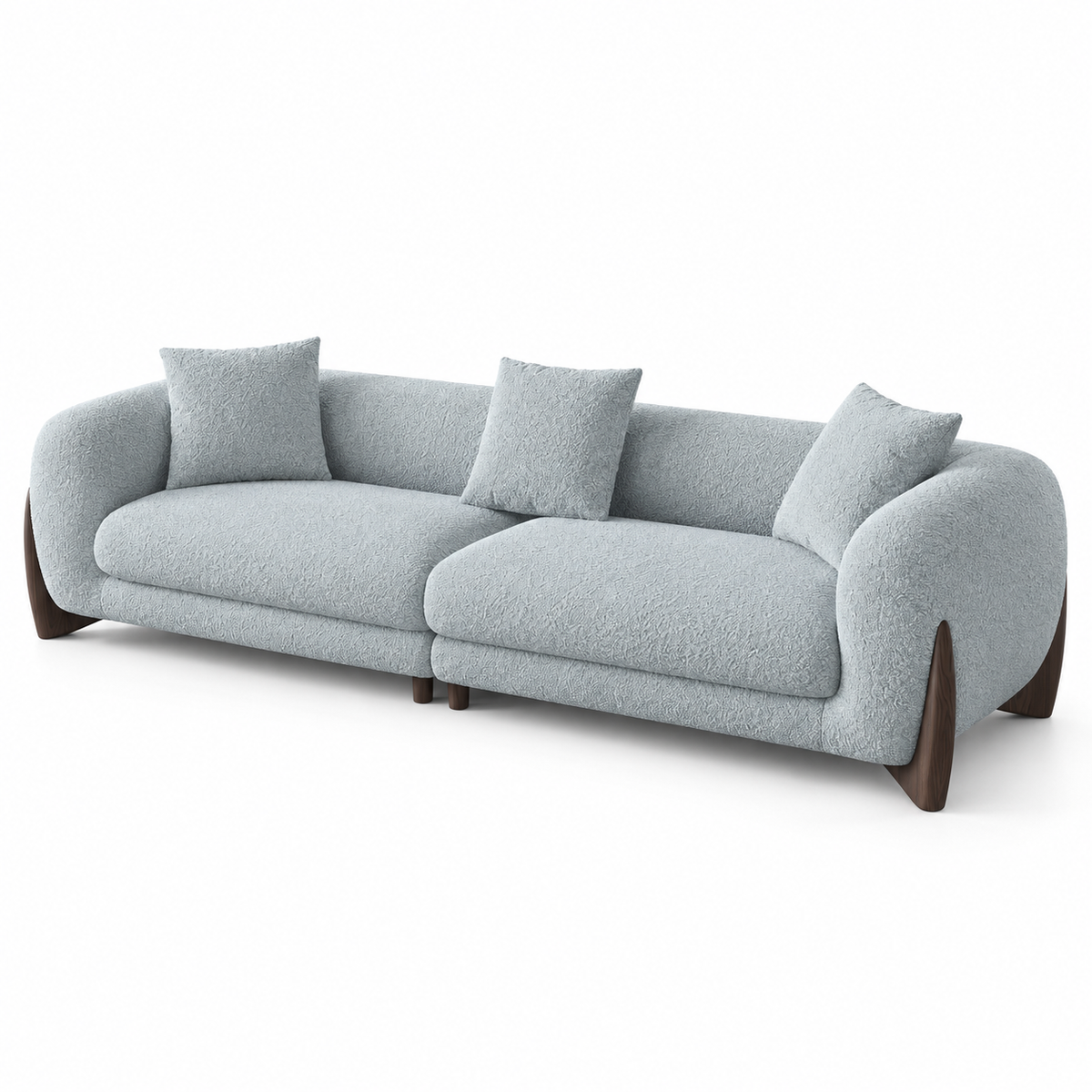 Covo sofa in soft grey boucle with a curved smoked-oak wood base and rounded arms, three-quarter view
