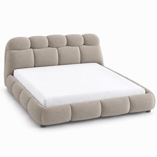 Ghaim Cloud Bed fully upholstered platform bed with padded headboard in warm ivory, three-quarter view