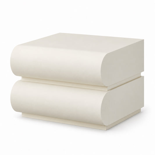Layl two-drawer nightstand with rounded scroll fronts in matt off-white, three-quarter view