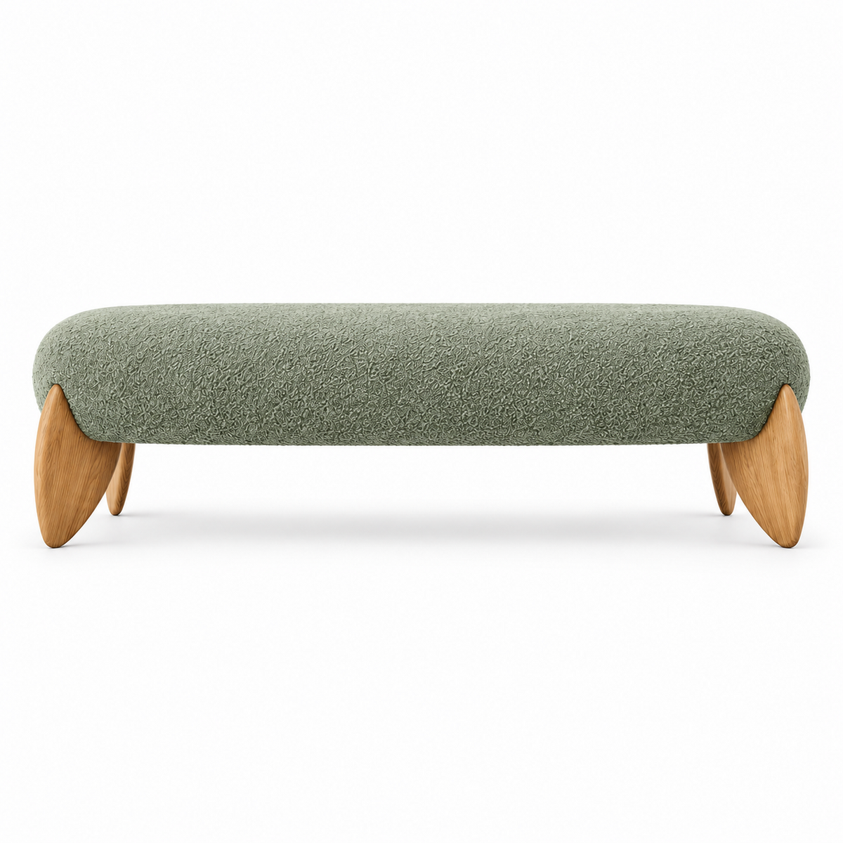 Vela bench front view showing the rounded capsule seat and flat leaf-shaped oak legs in sage green boucle