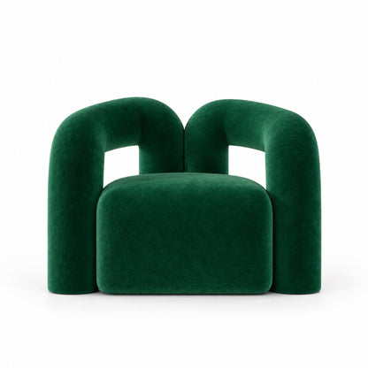 Nova armchair front view showing overlapping arch arms and plush seat in green velvet