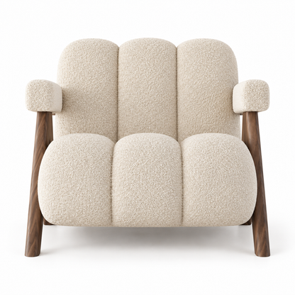 Chandi armchair front view showing channelled boucle seat and back in warm oatmeal
