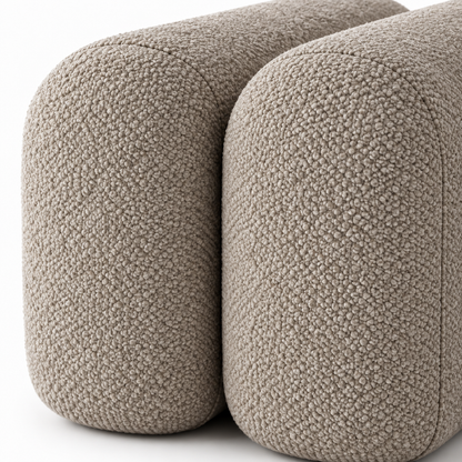 Close-up of mushroom taupe boucle texture and the channel between two rounded segments on the Onda bench