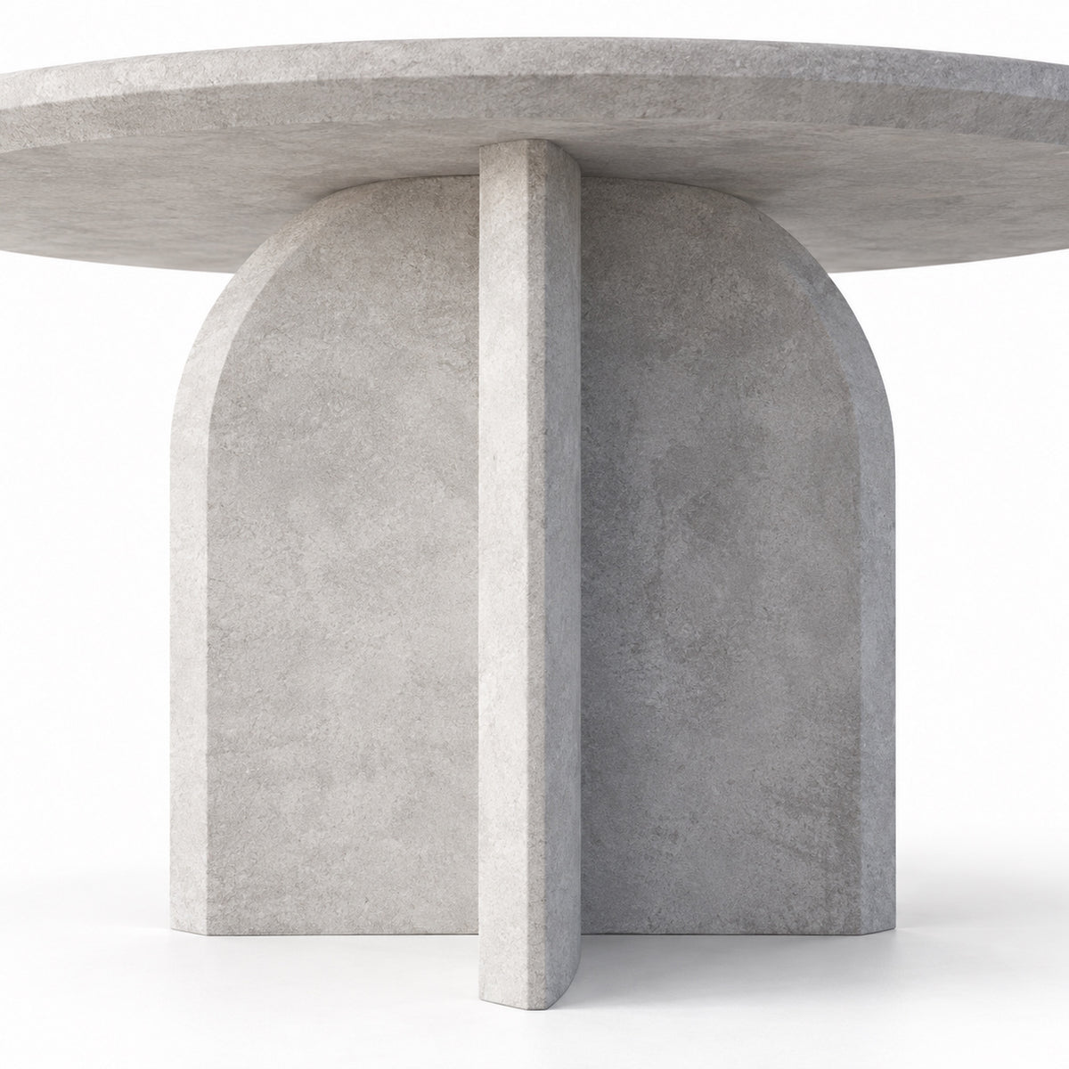 Close-up of Qamar dining table pedestal base where the arched slabs cross