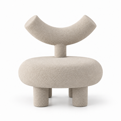 Taso accent chair front view showing round seat, four legs and curved horn backrest in sand boucle
