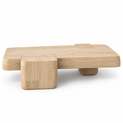 Kavo coffee table in pale natural ash with a stepped slab top and cube block, three-quarter view

