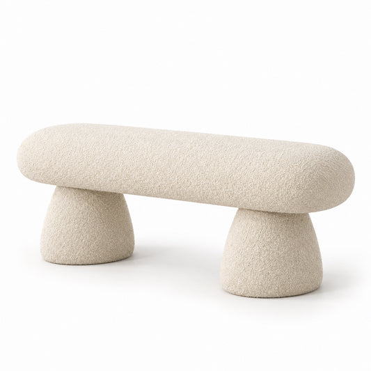Suda boucle bench with rounded pill seat and cone feet in off-white, three-quarter view