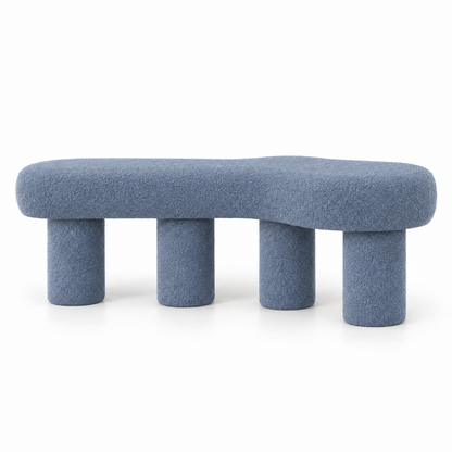 Oru bench front view showing the organic boucle top and four cylindrical legs in slate blue
