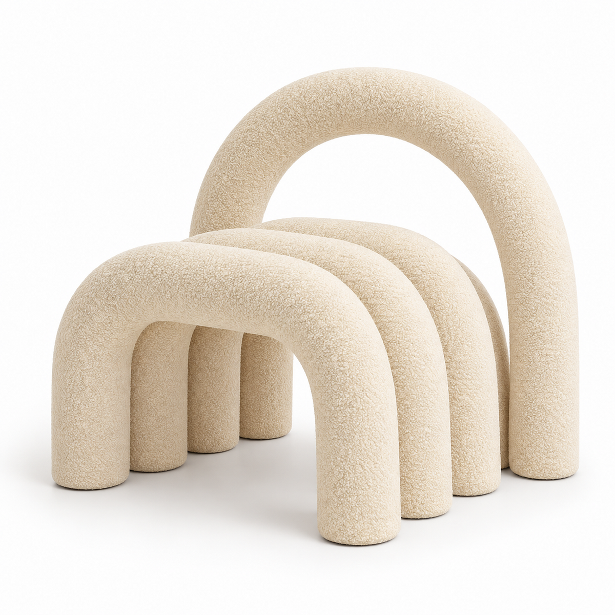 Loop sculptural accent chair with nested arched tubes and tall arch back in cream velvet, three-quarter view
