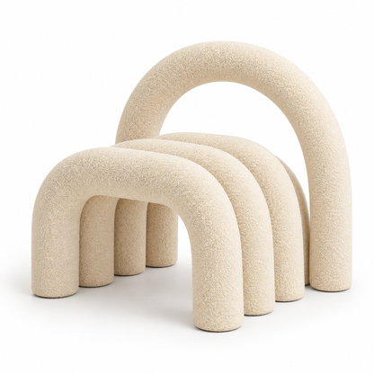 Loop sculptural accent chair with nested arched tubes and tall arch back in cream velvet, three-quarter view
